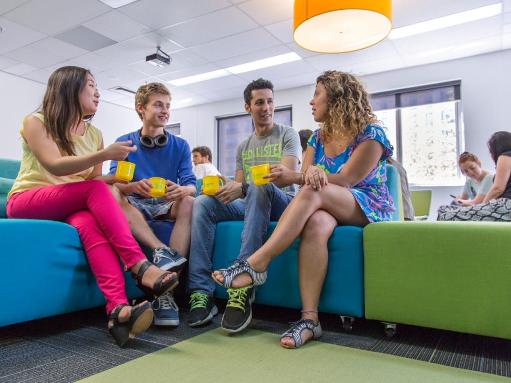 58b14a1c58__1. Common-room-ABILITY-students-holding-cups.jpg